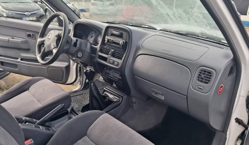 
								NISSAN NAVARRA 4X4  CAB DUPLA D 22 completo									